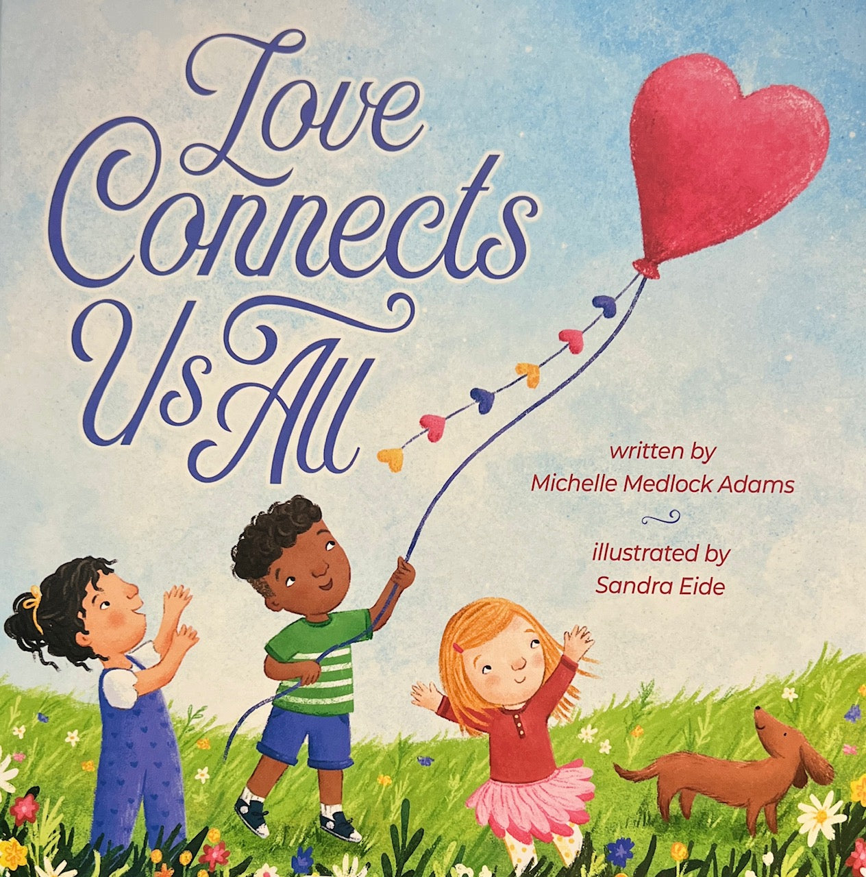Love Connects Us All - written by Michelle Medlock Adams